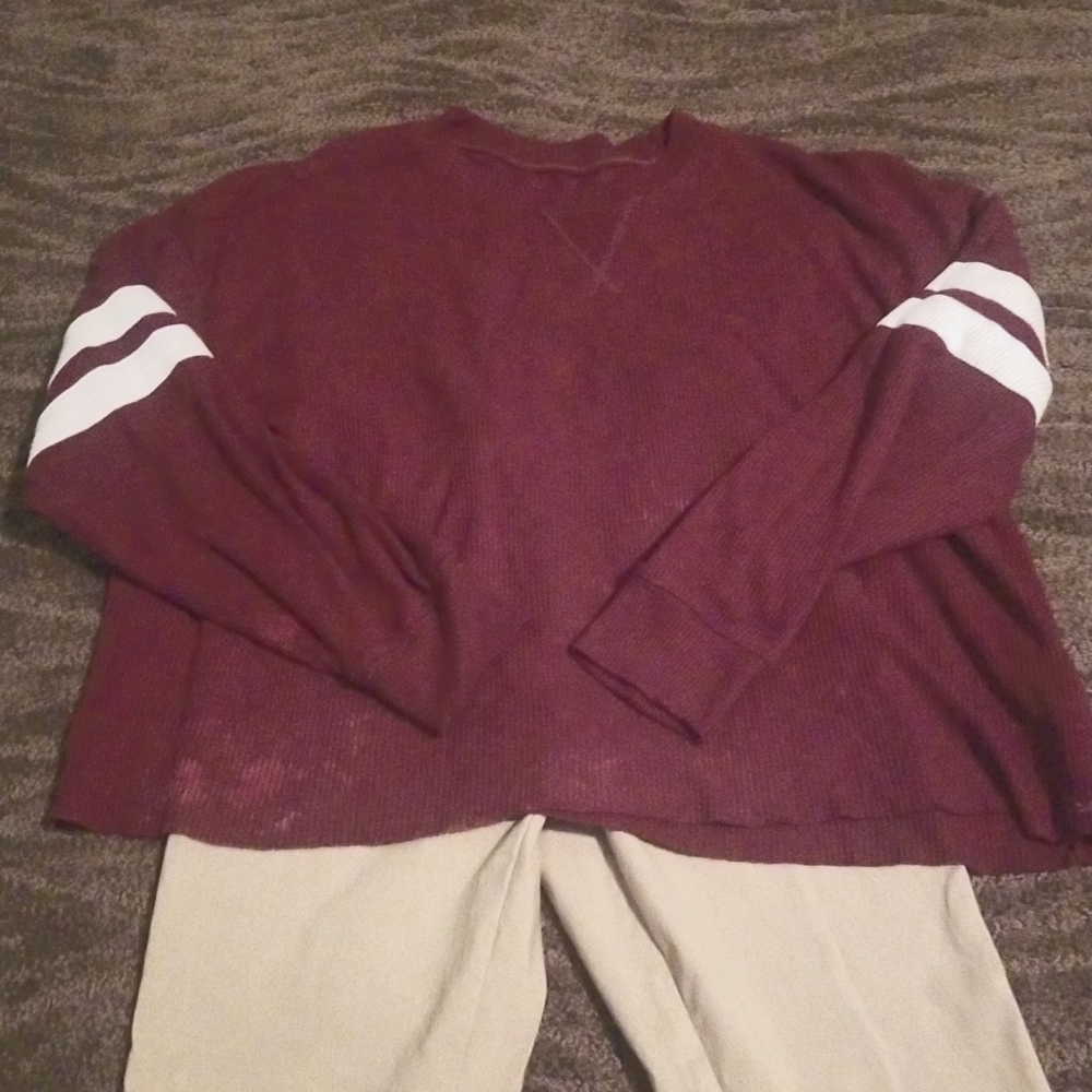 I oversized American Eagle shirt burgundy with white stripes on sleeves.